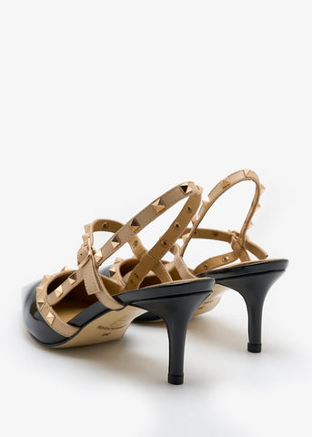 Lorianne Zeena black patent leather slingback pumps with beige straps and gold studs. Pointed toe, buckle fastening.